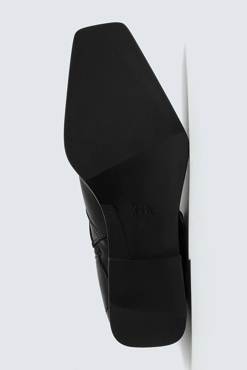 BOTTINE EN CUIR À BOUCLE