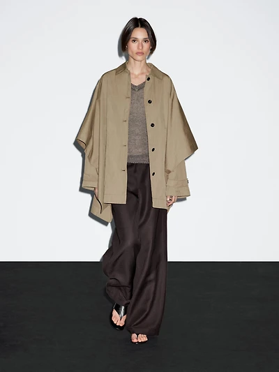 Cape trench coat with long sleeves