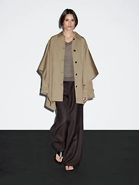 Cape trench coat with long sleeves