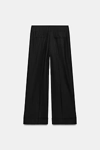 PANTALON LARGE À REVERS