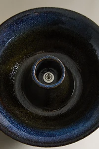 IRON AND STONEWARE CANDLEHOLDER