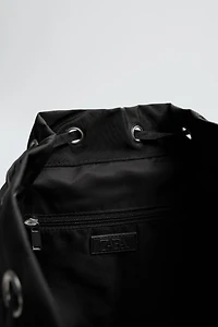 TECHNICAL FLAP BACKPACK