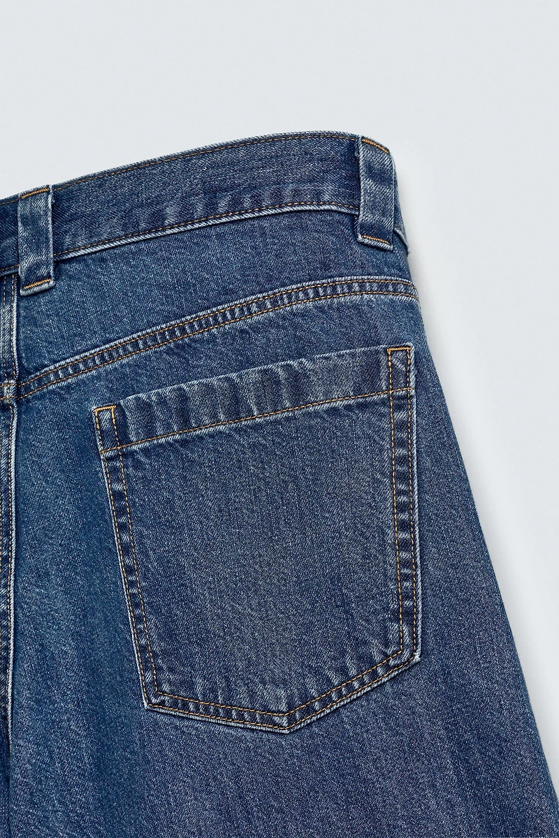 PLEATED RELAXED FIT DENIM SHORTS