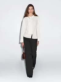 Round-neck shirt with button details