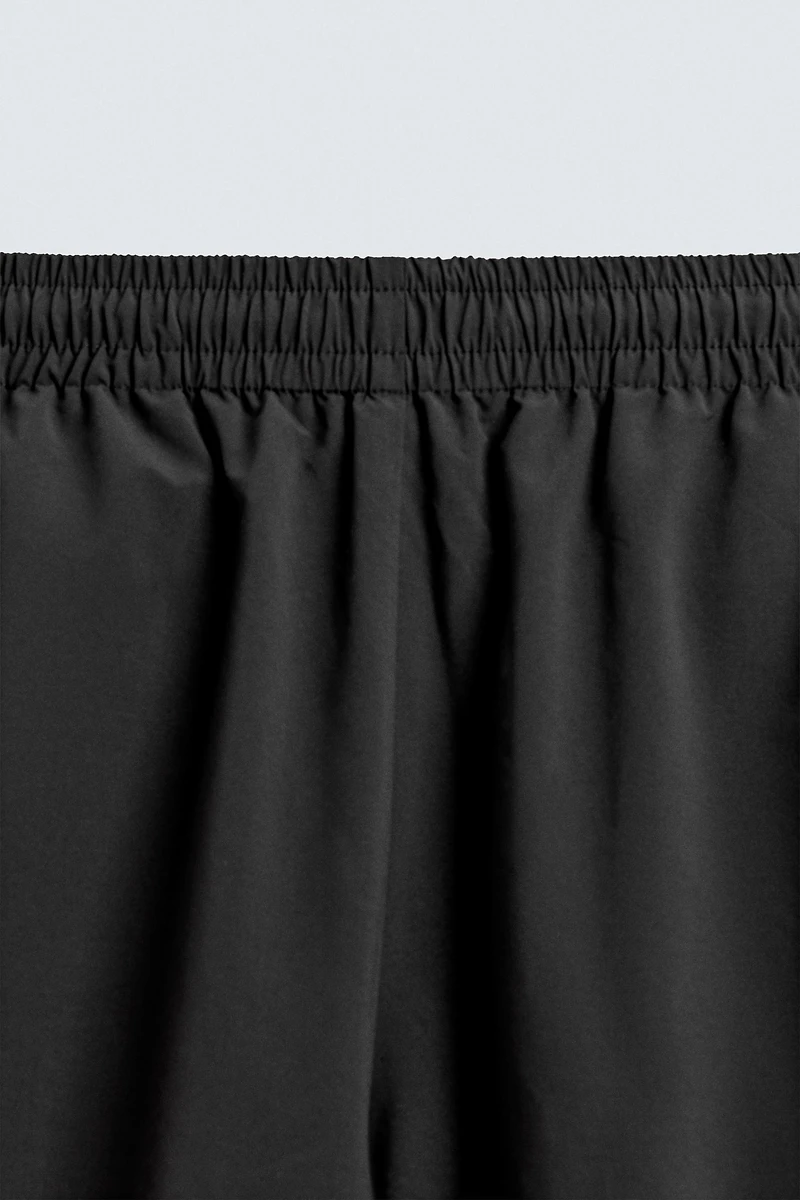 TECHNICAL PANTS WITH STRIPES
