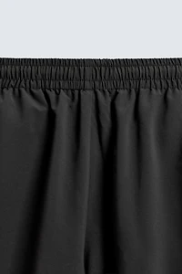 TECHNICAL PANTS WITH STRIPES