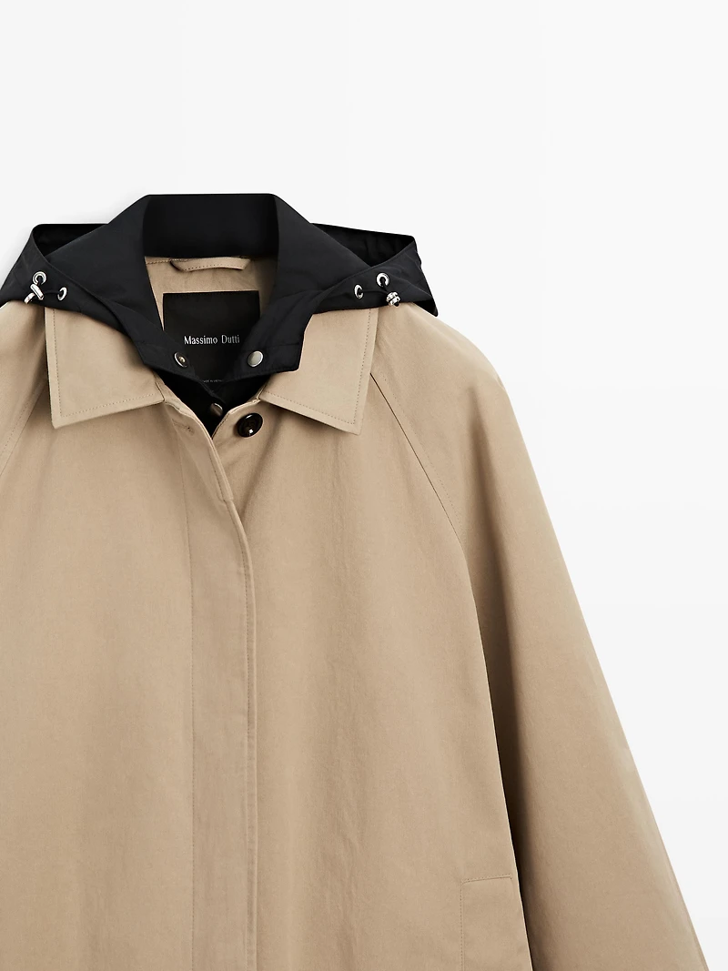 Cape trench coat with detachable hood
