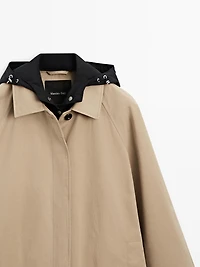 Cape trench coat with detachable hood