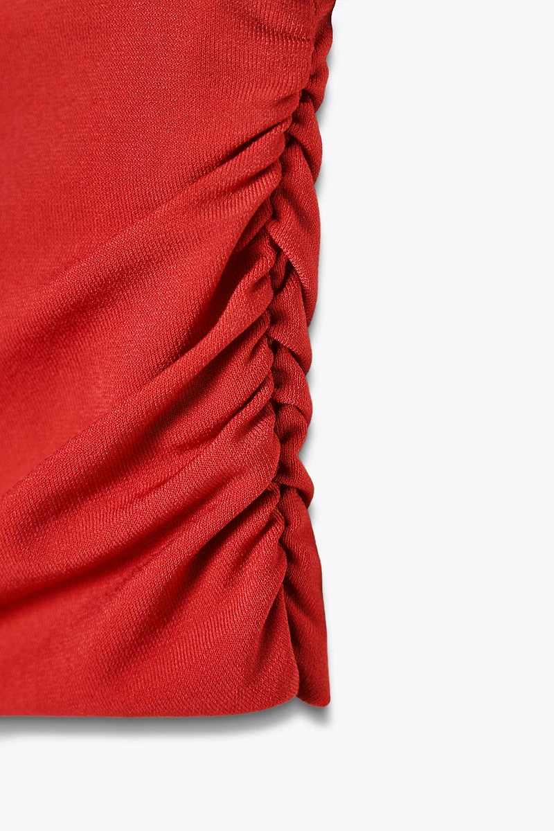 DRAPED SHOULDER PAD TOP