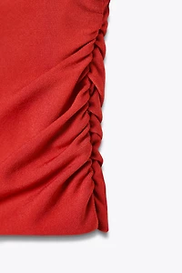 DRAPED SHOULDER PAD TOP