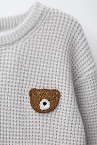 WAFFLE KNIT TEDDY BEAR PATCH SWEATER