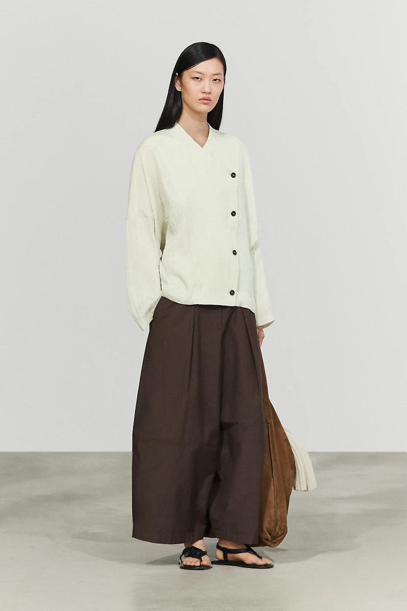 Fluid wrap shirt with button detail