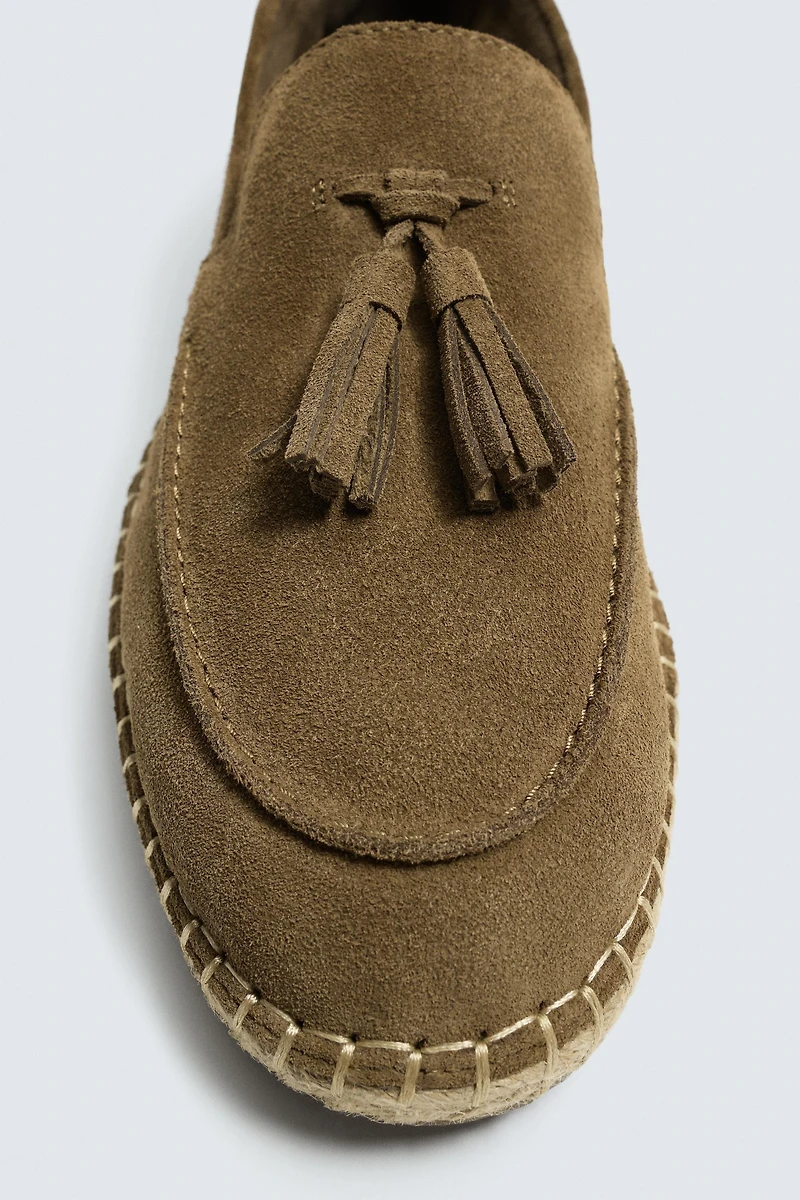 MOCASSINS CASUAL EN CUIR À POMPONS