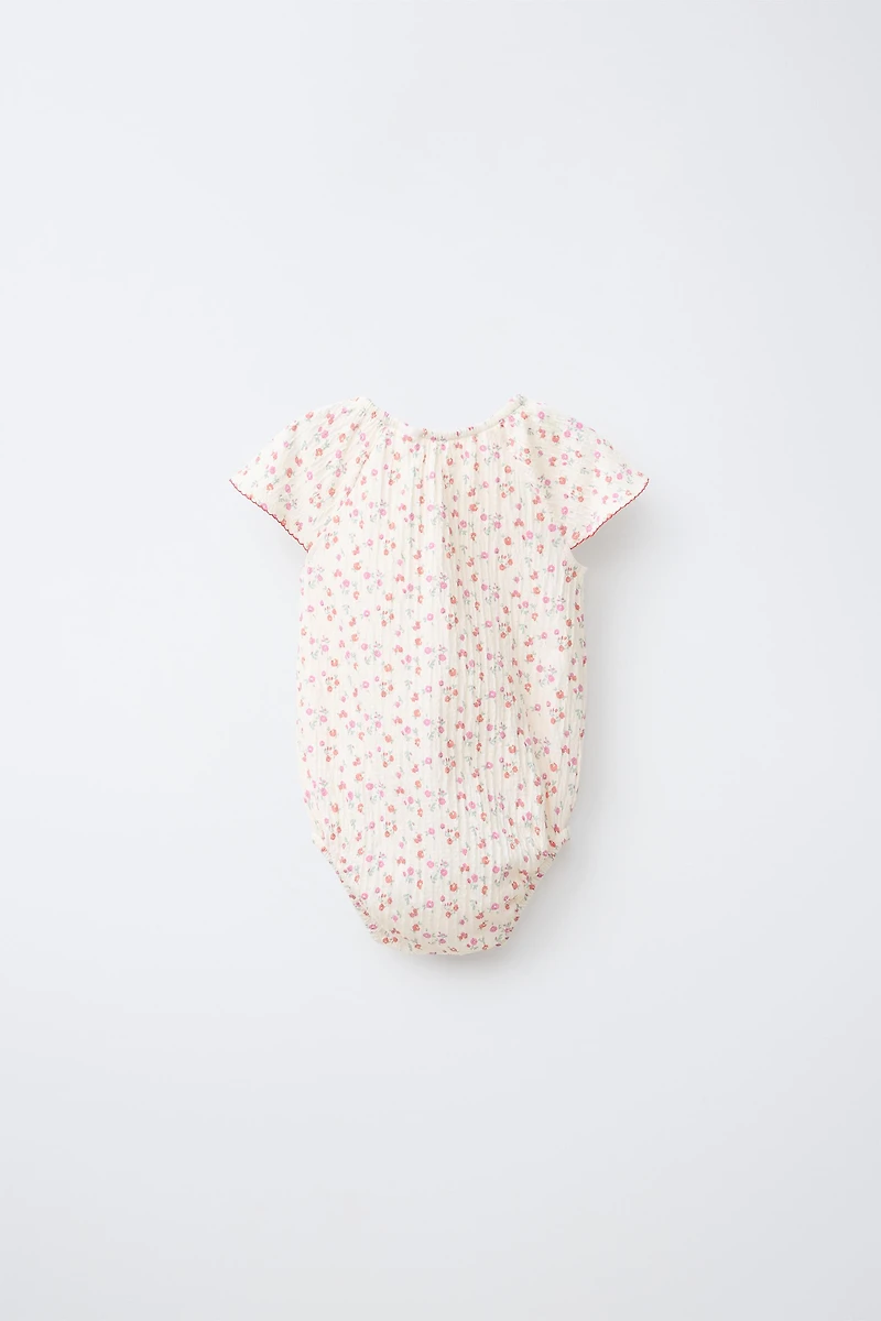 TEXTURED FLORAL BODYSUIT