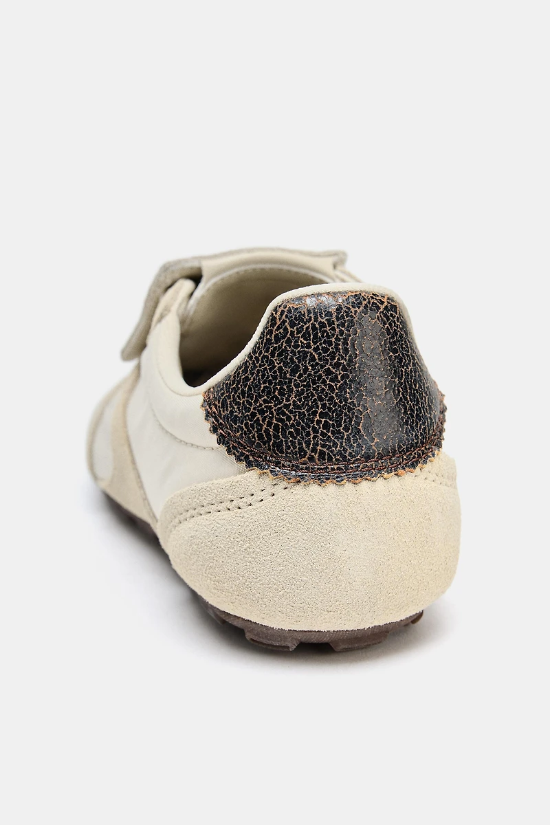 TENNIS DÉTAIL LANGUETTE