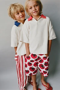 WAVE STRIPED PANTS
