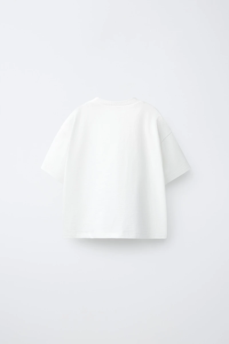 T-SHIRT À PIÈCES EN CROCHET