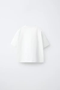 T-SHIRT À PIÈCES EN CROCHET