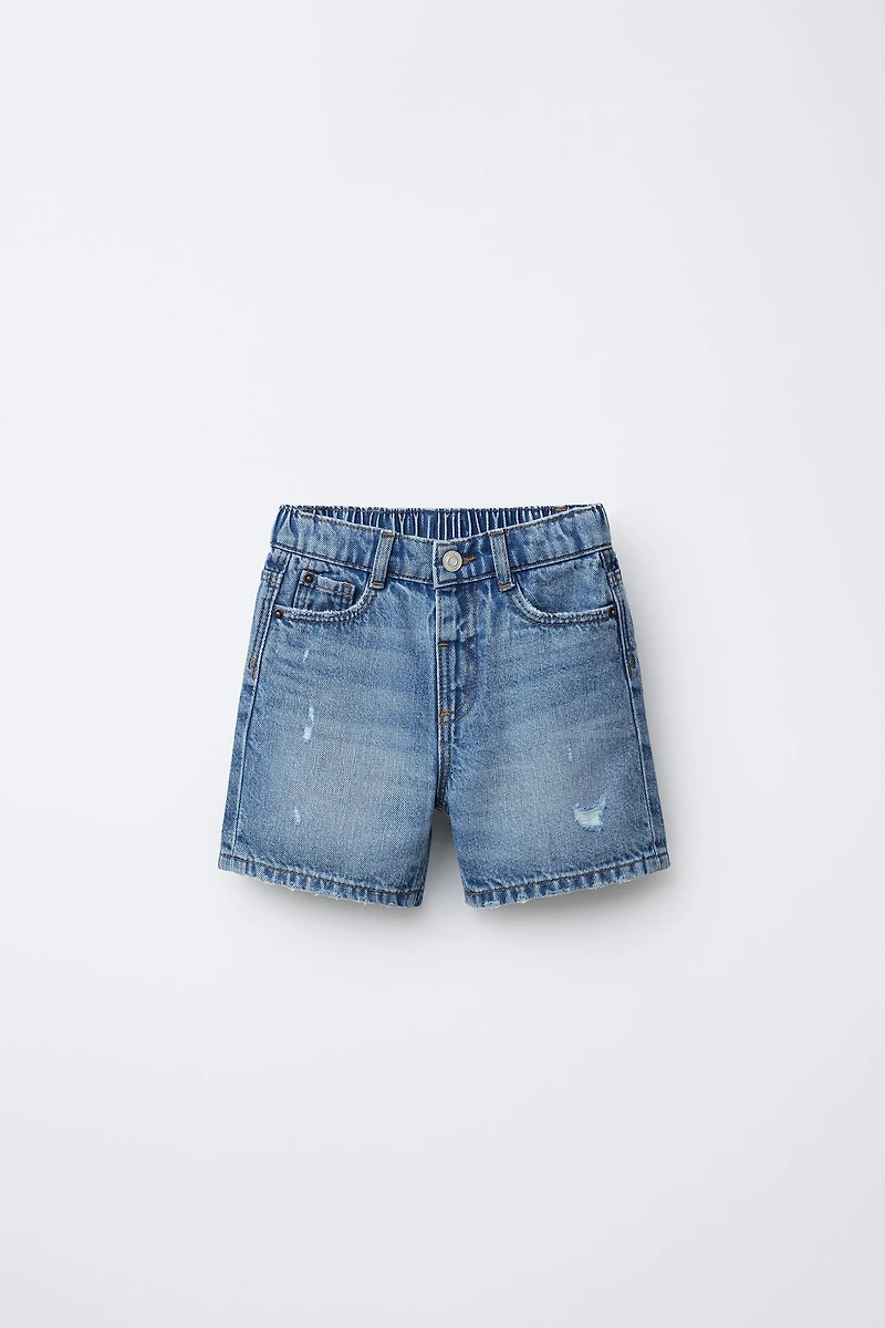 BERMUDA EN JEAN BAGGY DÉCHIRÉ
