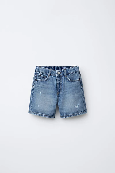 BERMUDA EN JEAN BAGGY DÉCHIRÉ
