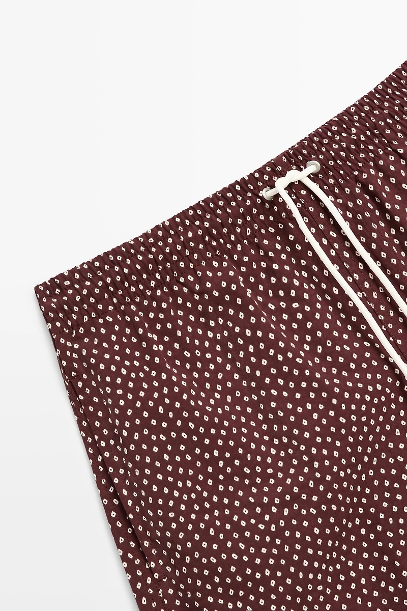 Polka dot print swimming trunks