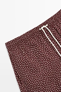 Polka dot print swimming trunks