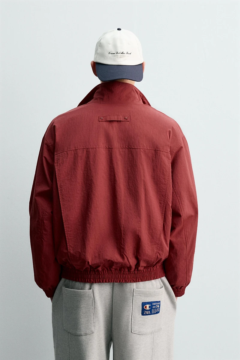 CHAMPION® X ZARA TECHNICAL PATCH JACKET