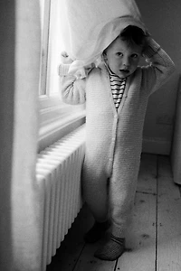 HOODED CHUNKY KNIT JUMPSUIT