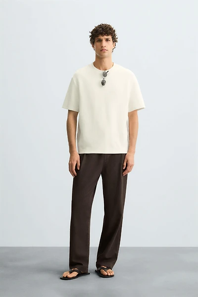 FLOWY PLEATED PANTS