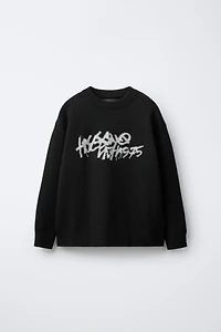 GRAFFITI KNIT SWEATER