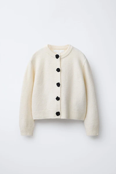 SATIN FLOWER BUTTON KNIT CARDIGAN