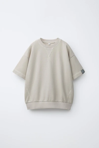 T-SHIRT MOLLETONNÉ À ÉTIQUETTE