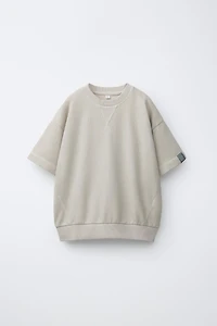 T-SHIRT MOLLETONNÉ À ÉTIQUETTE
