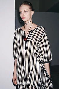 TOP EN MAILLE RAYÉ AVEC LIN