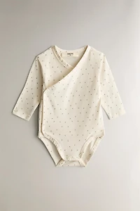 SET OF PRINTED BABY BODYSUITS
