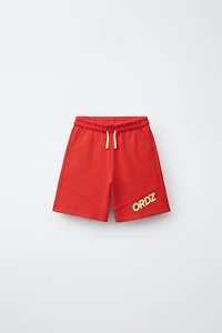 LOGO PLUSH SHORTS