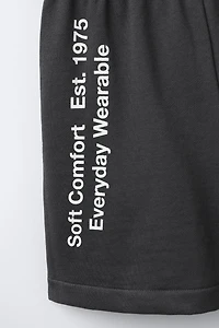 TEXT JOGGING SHORTS