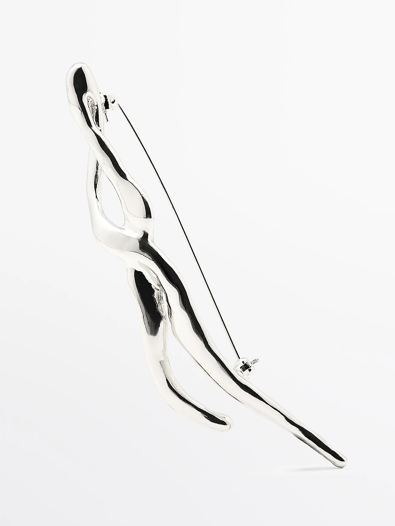 Broche métallique abstraite