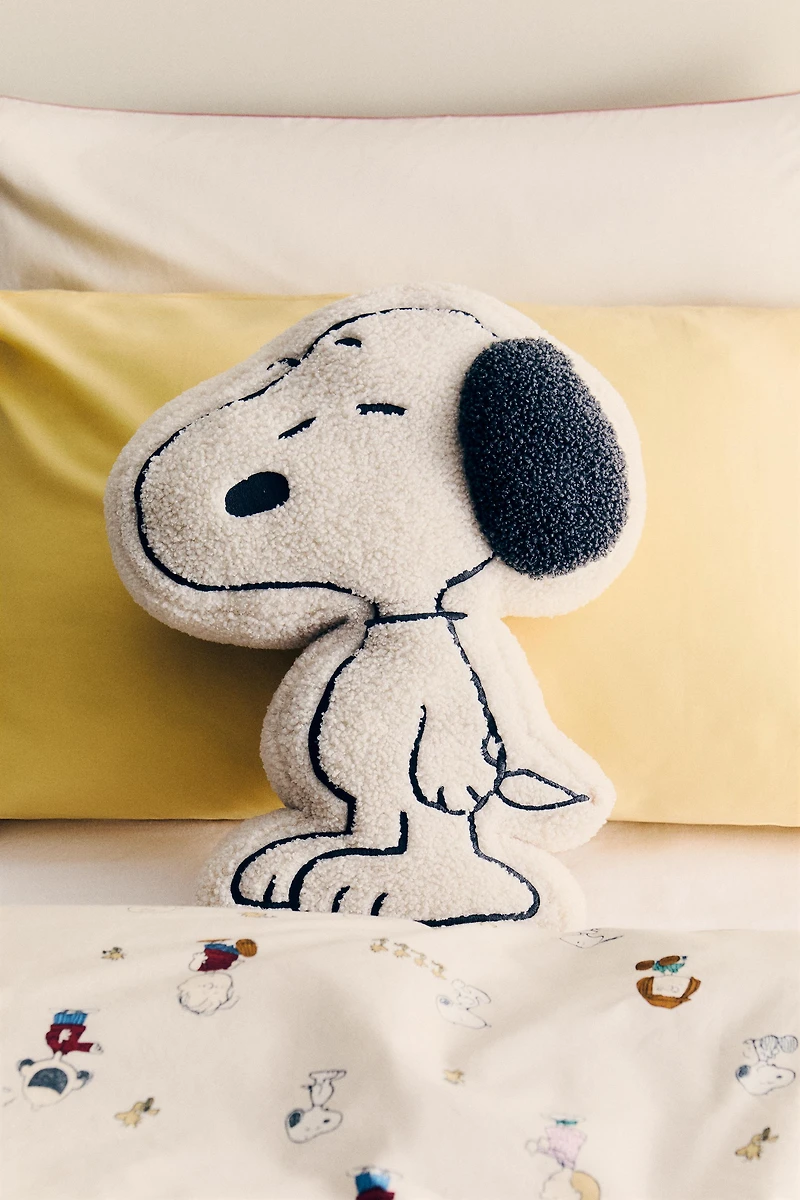 COUSSIN ENFANT EFFET PEAU D’AGNEAU PEANUTS™
