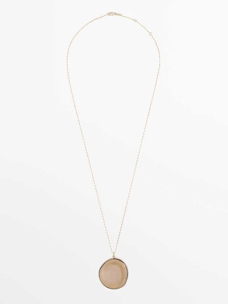 Collier pendentif pierre translucide