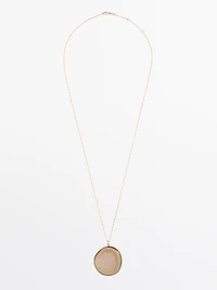 Collier pendentif pierre translucide