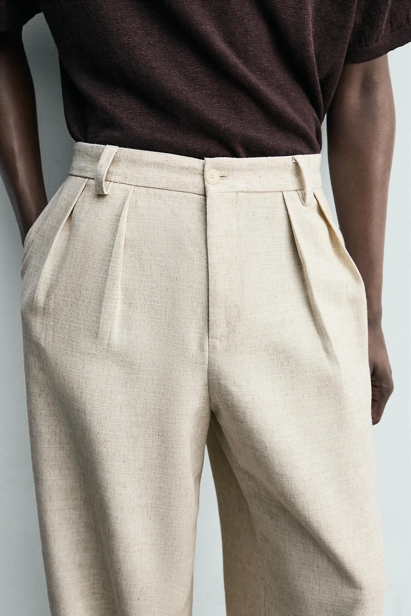PLEATED RELAXED FIT PANTS