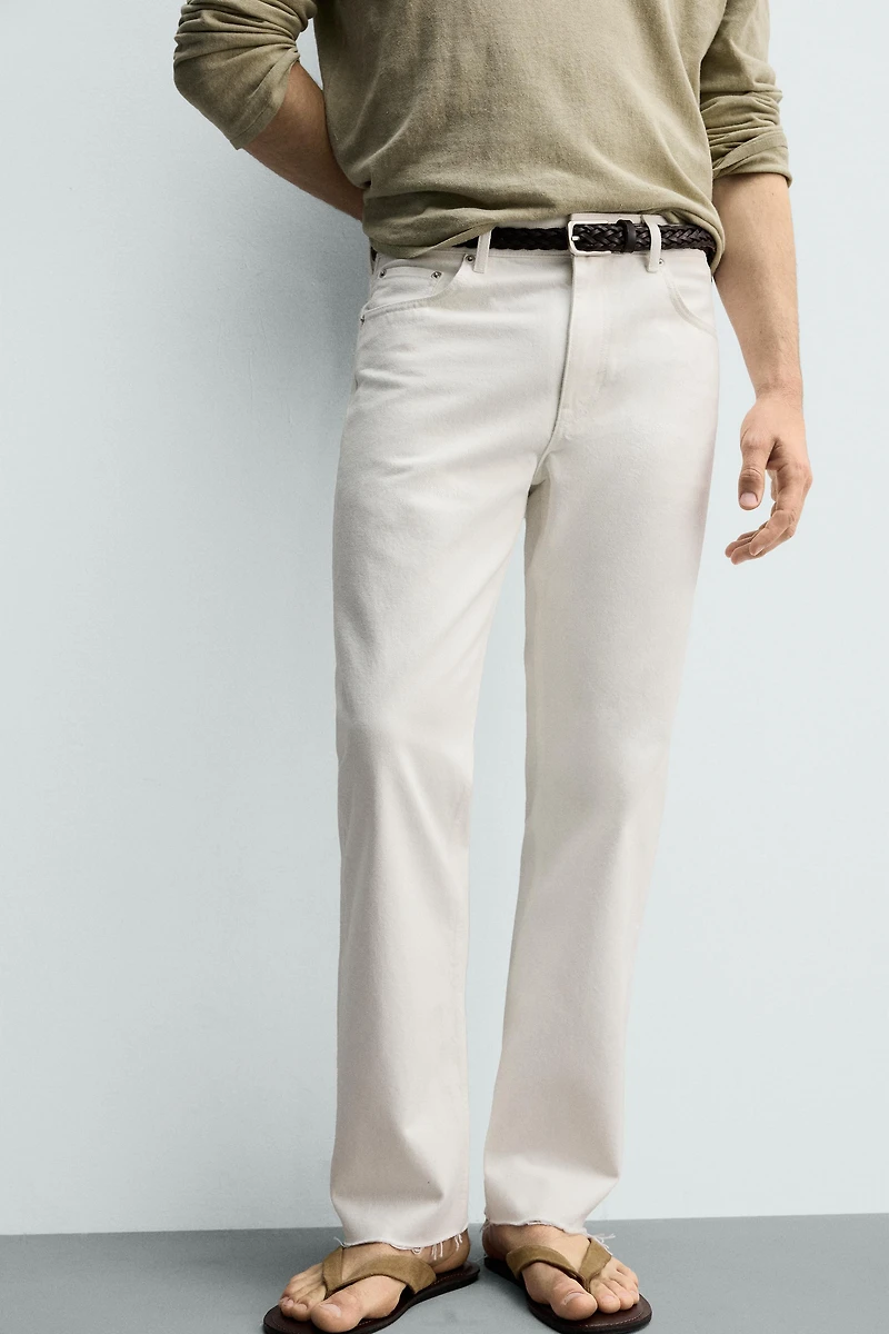 IRREGULAR HEM STRAIGHT FIT JEANS