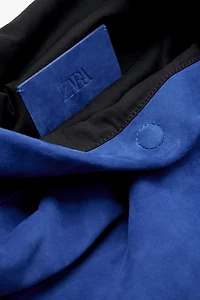 LIMITED EDITION MAXI SUEDE CLUTCH