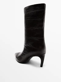 Bottines à talon en cuir grav