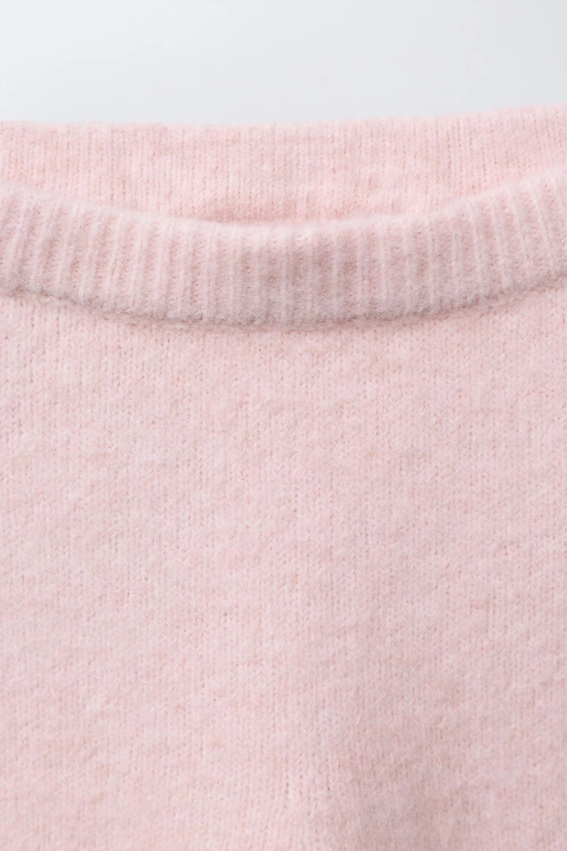 LEGGING EN MAILLE AVEC POCHE ET VOLANTS