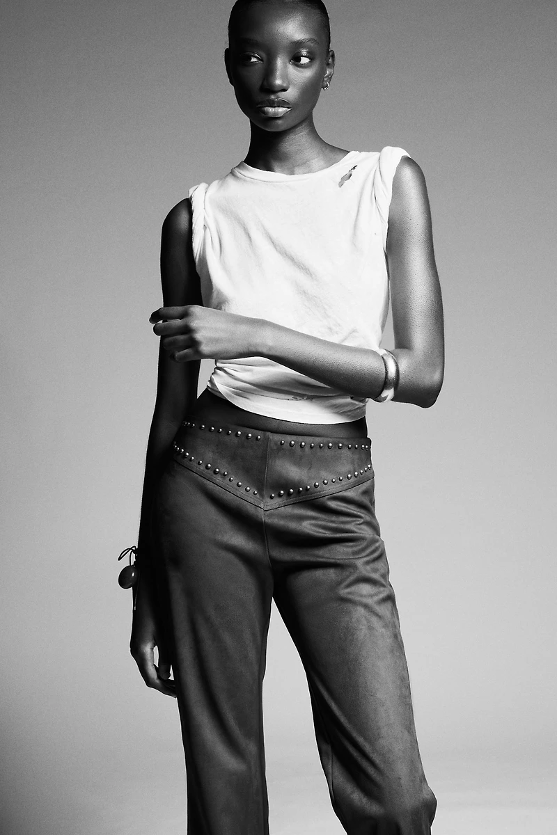PANTALON FLARE EFFET DAIM CLOUS