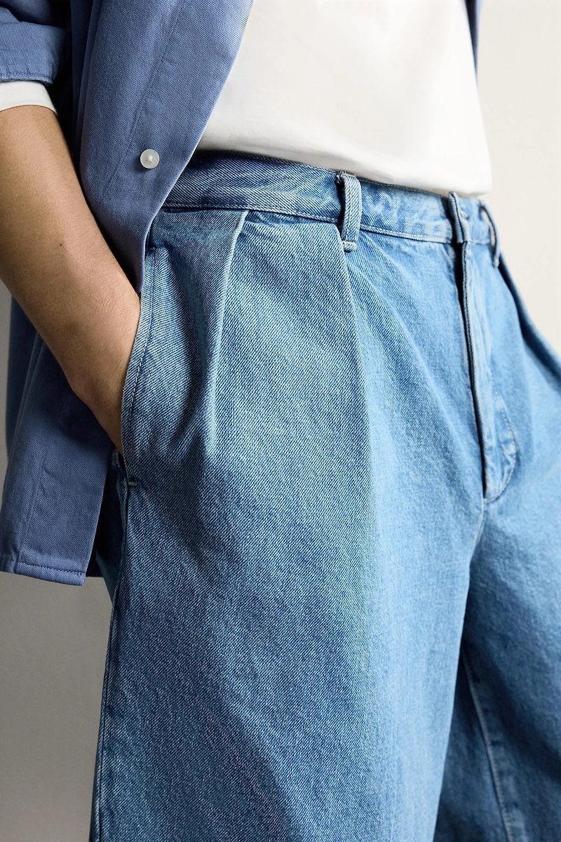 RELAXED FIT PLEATED DENIM CHINO SHORTS