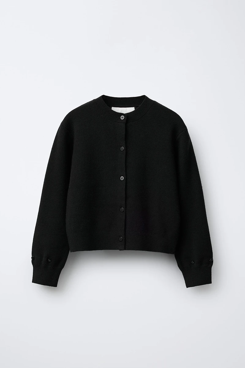 GILET EN MAILLE PLUMES DÉTACHABLES