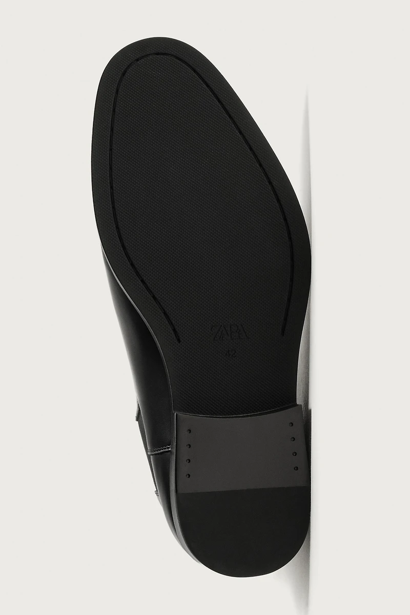 POINTED-TOE CHELSEA BOOTS